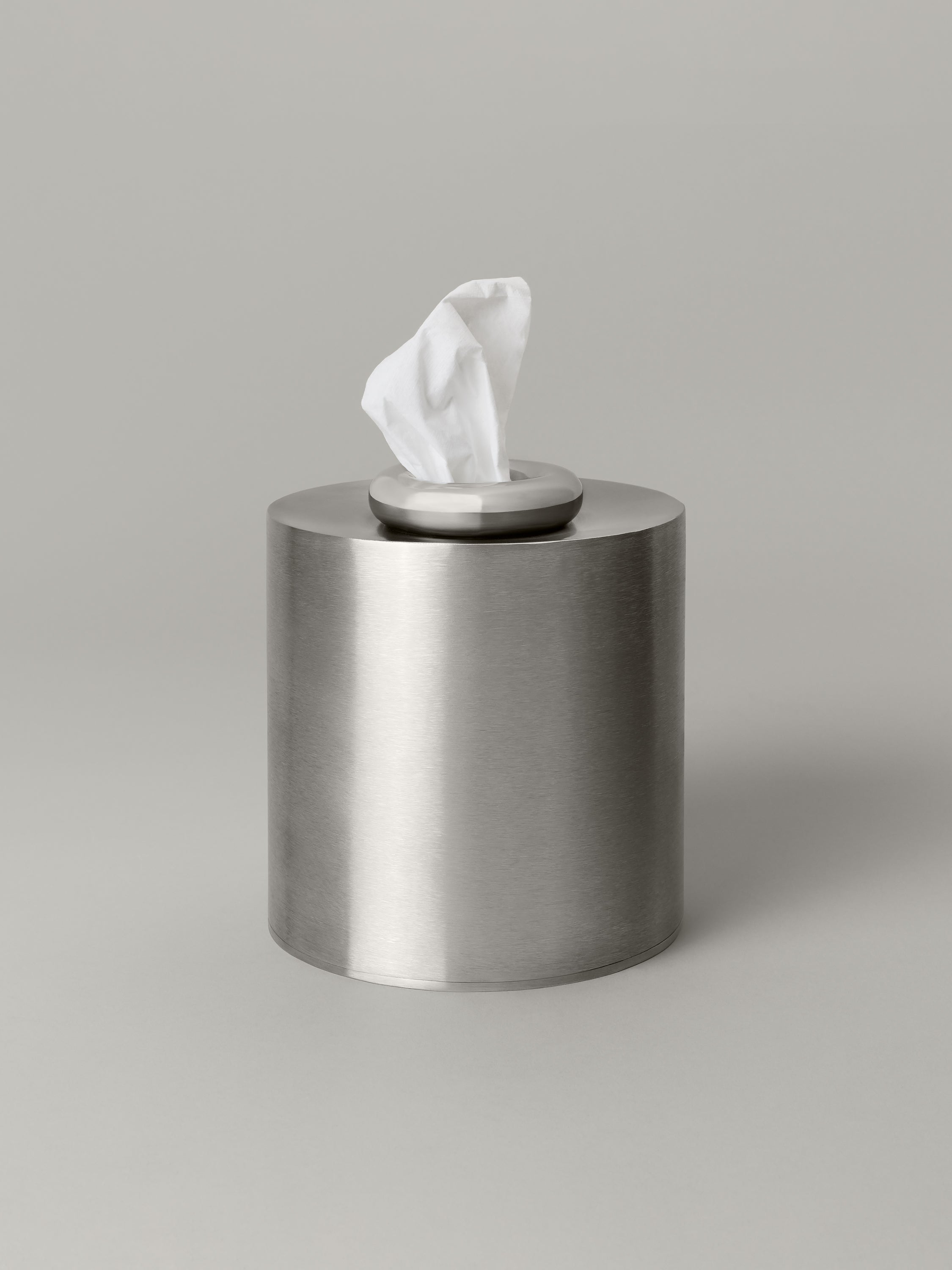 Stainless steel tissue box cover with a weighted, donut-shaped top