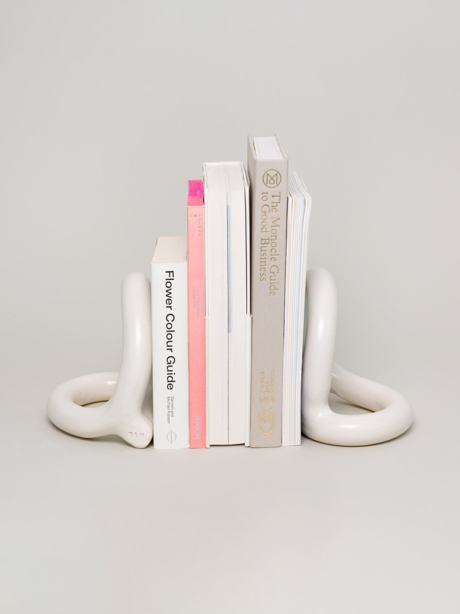 Bacchus Bookends (1 Pair), Cream – SIN | Home Goods